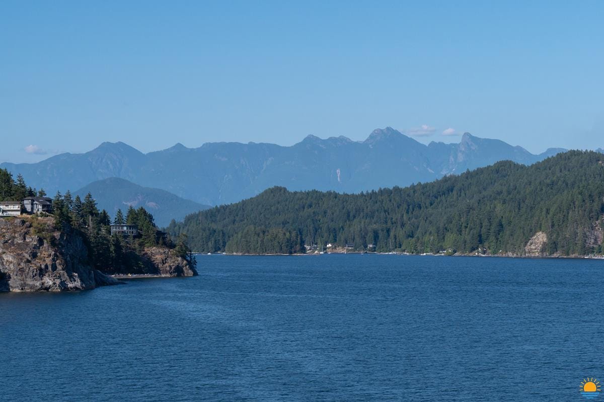 Looking towards Gibsons, BC from Gospel Rock. That’s the Bluff on the left, Keats Island is on the right, Gambier Island is behind Keats, and in the distance are the North Shore Mountains.