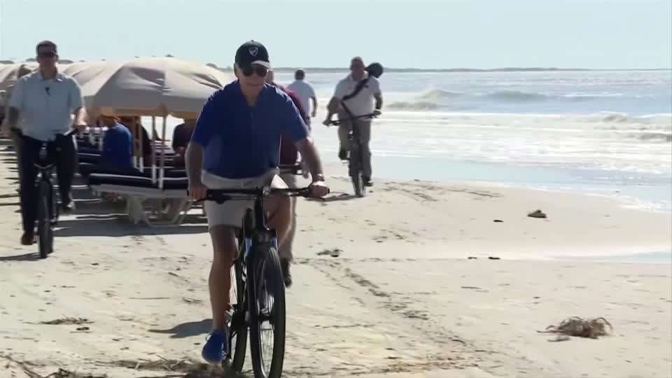 Biden takes bike ride along South Carolina's beach | Watch