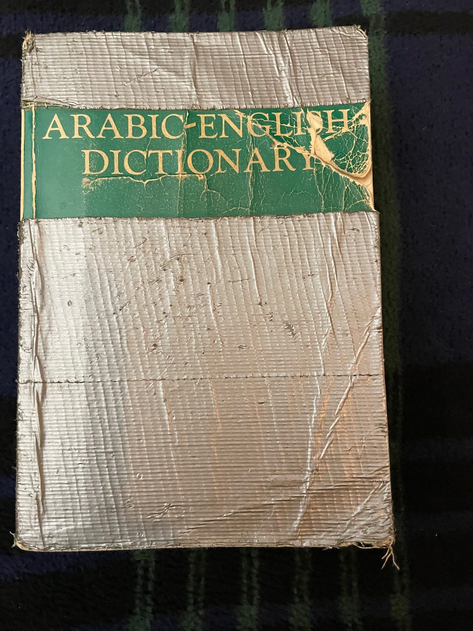 Photo of the well-used cover of Hans Wehr's Arabic-English
