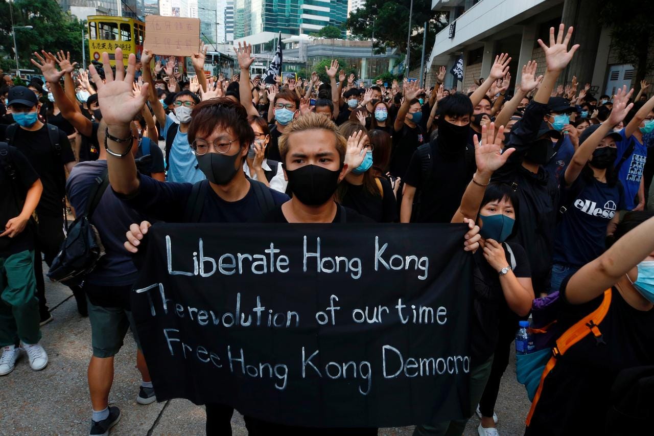 Hong Kong protesters stage peaceful rallies calling for ...