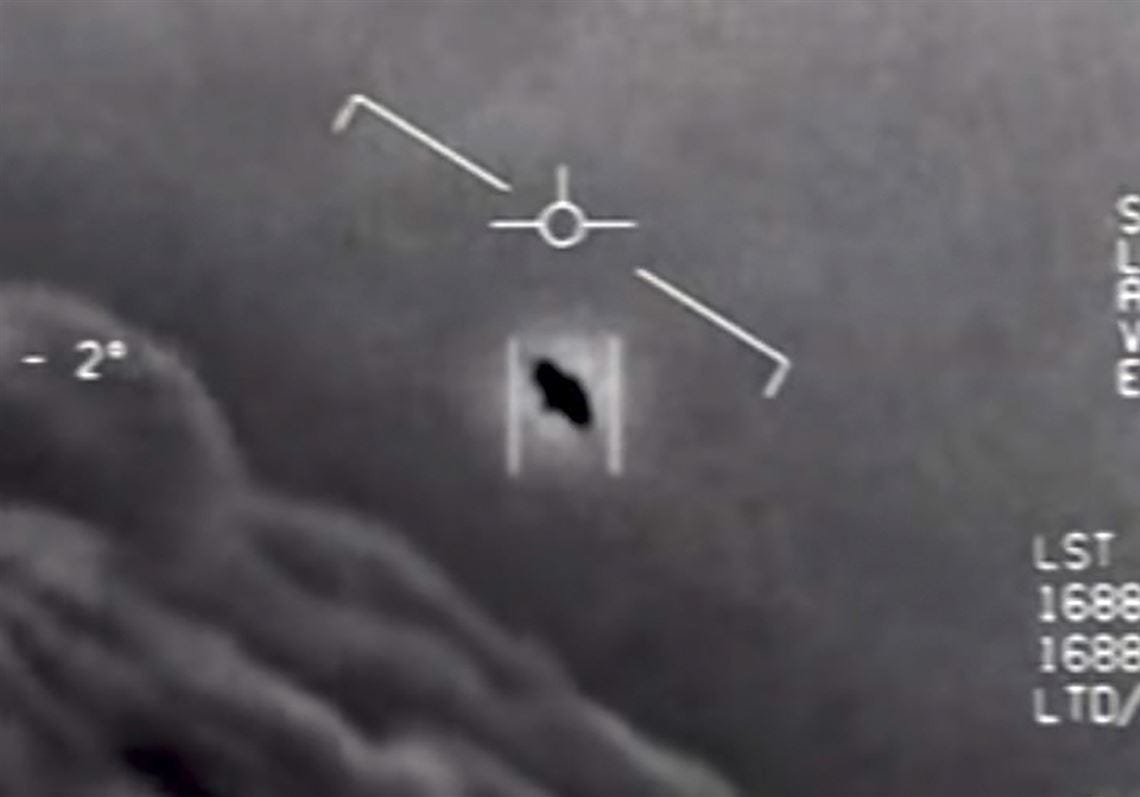 A still image from video released by the Department of Defense shows a 2004 encounter near San Diego between two Navy F/A-18F fighter jets and an unknown object. The Pentagon is forming a new task force to investigate UFOs that have been observed by U.S. military aircraft, according to two defense officials.