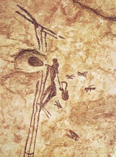 cave painting spider cave in valencia spain with person keeping bees collecting honey