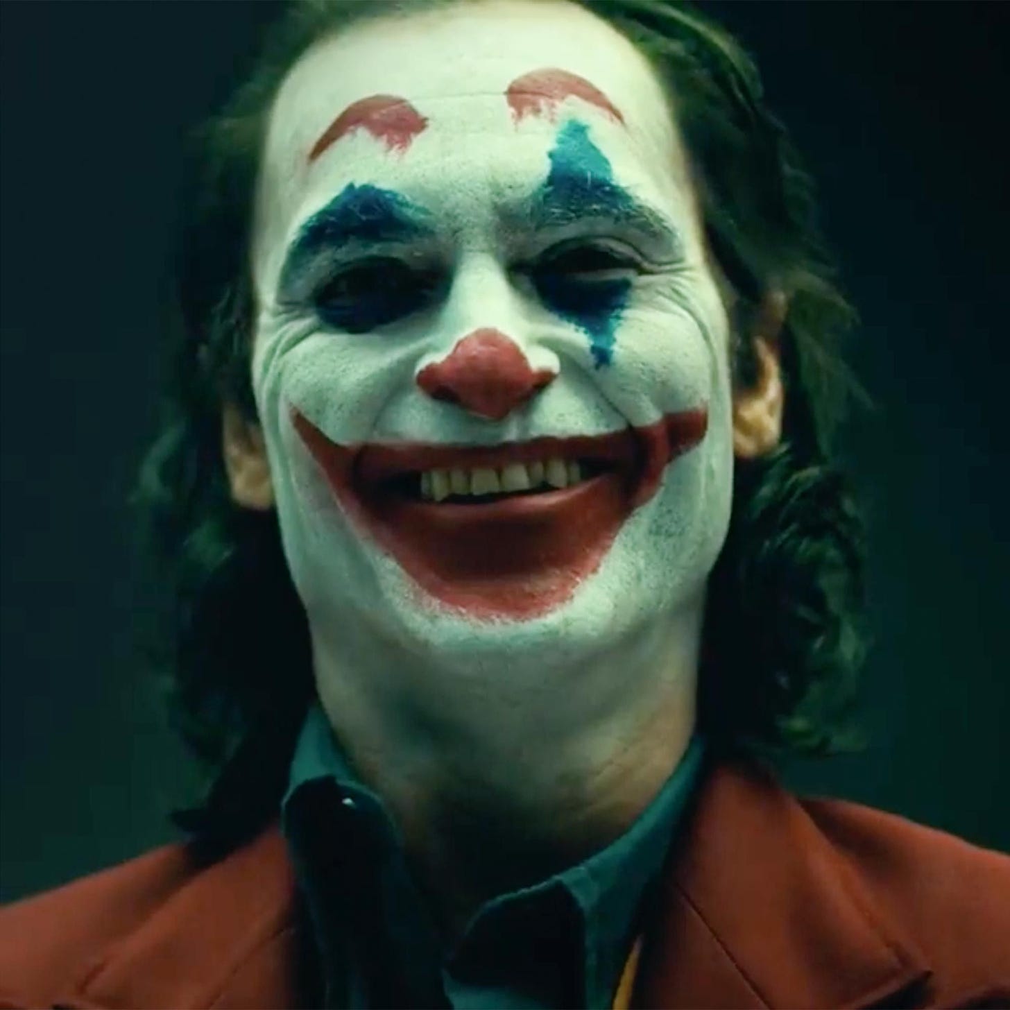 Joaquin Phoenixs Joker revealed in full makeup for first time | Joker film,  Joker smile, New joker movie
