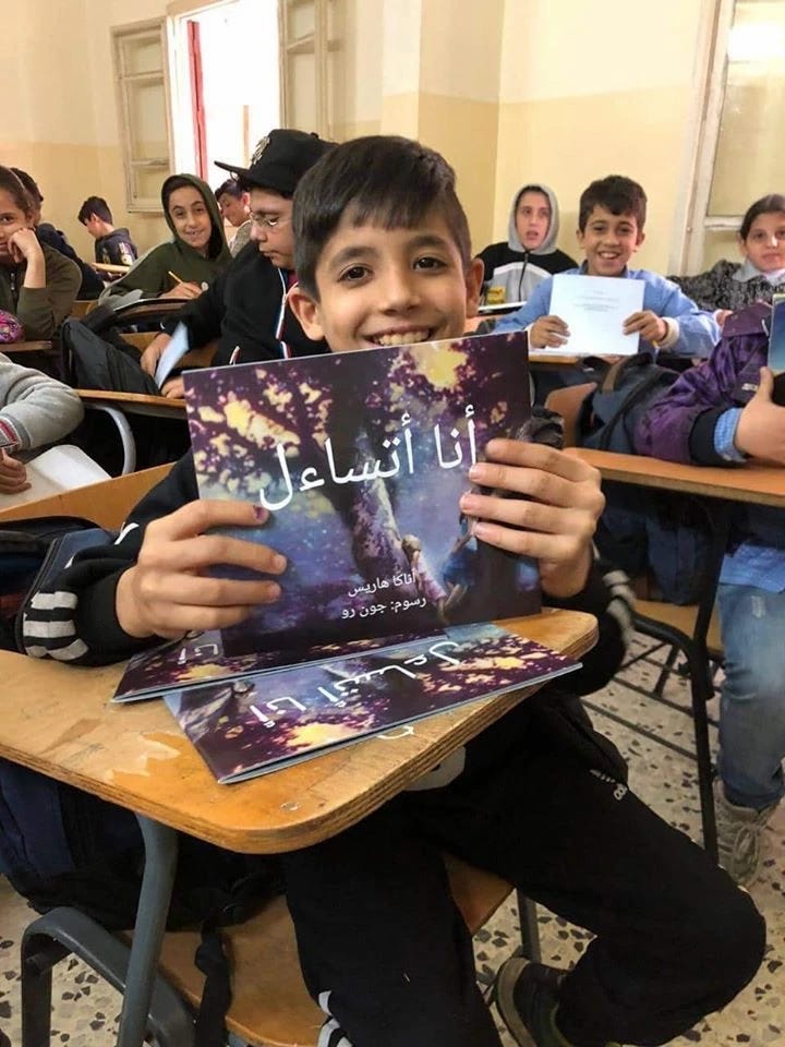 Smiling chidren thanks to the operation of Reviving the Great Library Of Mosul