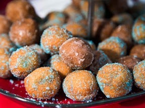 Cotton candy and cola flavoured timbits at the CNE in 2015. Tim Hortons' first Chinese store features unique timbits.