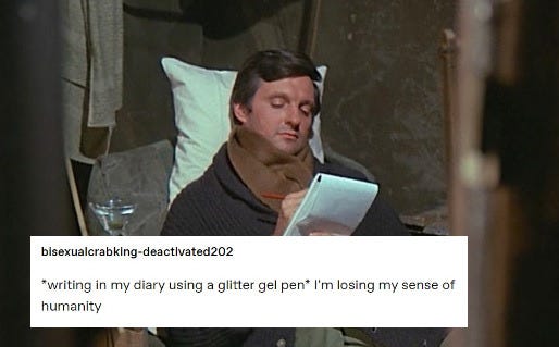 a picture of Alan Alda playing Benjamin "Hawkeye" Pierce on the television show MASH. He is seated on a cot bundled up with a coat and scarf writing a letter. The caption, which is a tumblr text post, says "writing in my dairy using a glitter gel pan: I'm losing my  sense of humanity" 