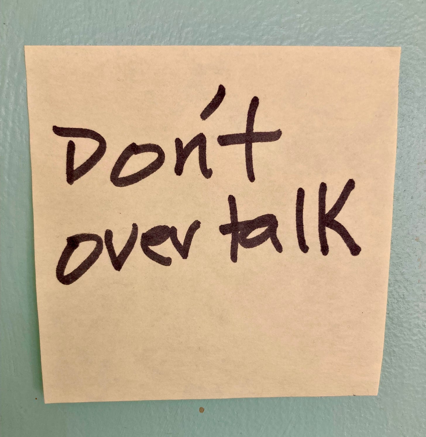 Post-it on wall: "Don't overtalk"