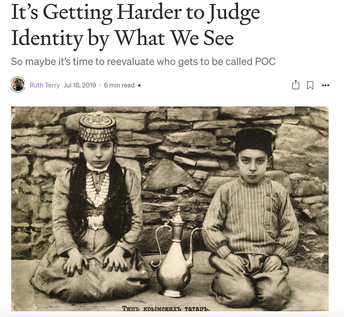 Screenshot of article header with picture of two Crimean Tatar children in traditional dress.