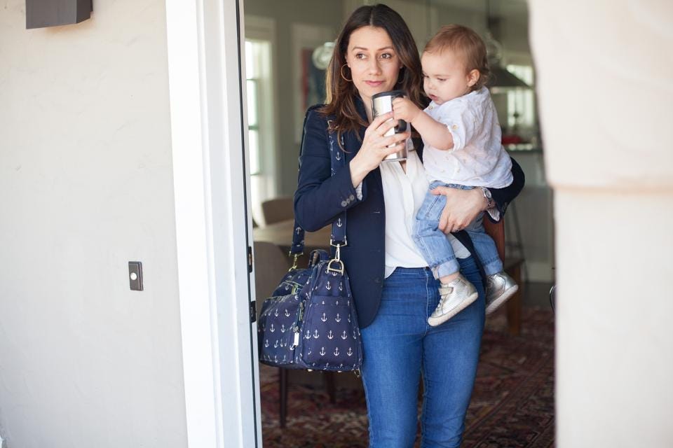 Shadiah Sigala, the cofounder and CEO of Kinside, with her daughter
