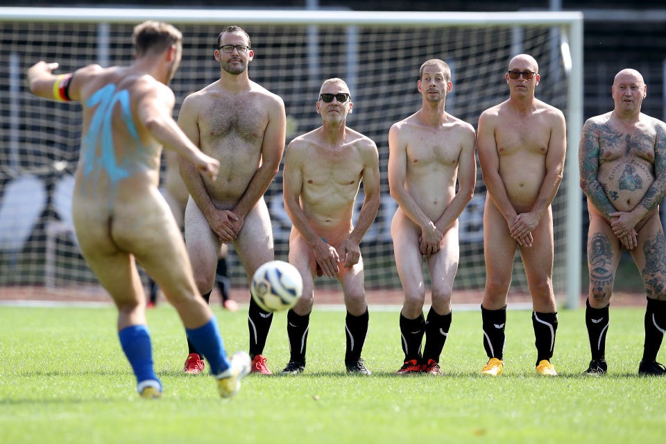 A naked wall gear up for a free kick during a German game