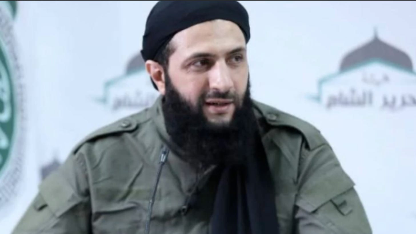 Hayat Tahrir al-Sham -terroristijärjestön (HTS, entinen al-Nusra-rintama, Syyrian al-Qaedan jaoston) johtaja Abu Mohammad al-Jolani.