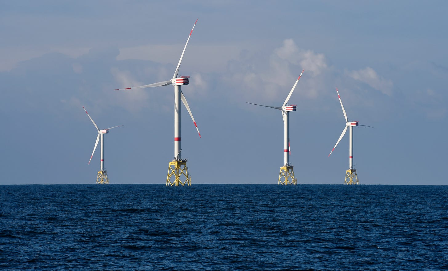 A view shows windmills of several wind farms at the so-called "HelWin-Cluster", located 35 kilometres (22 miles) north of the German island of Heligoland November 5, 2014. REUTERS/Fabian Bimmer/Files