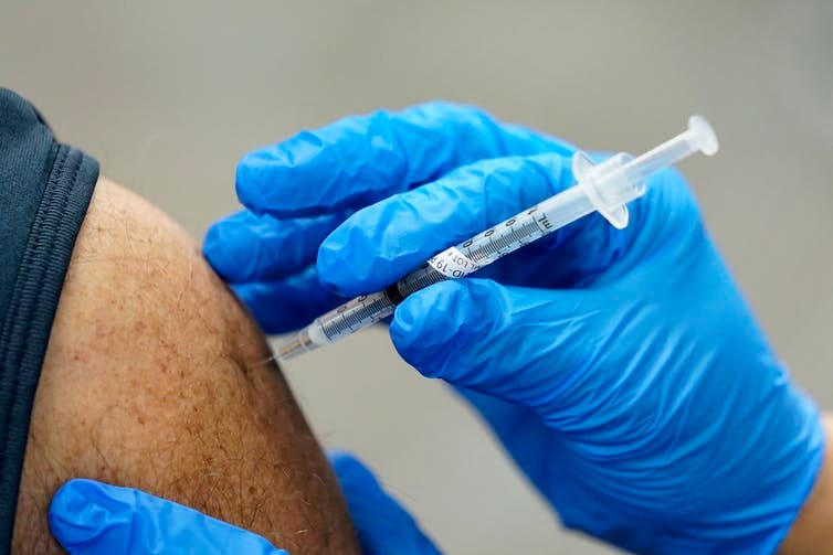 A person getting the coronavirus vaccine.
