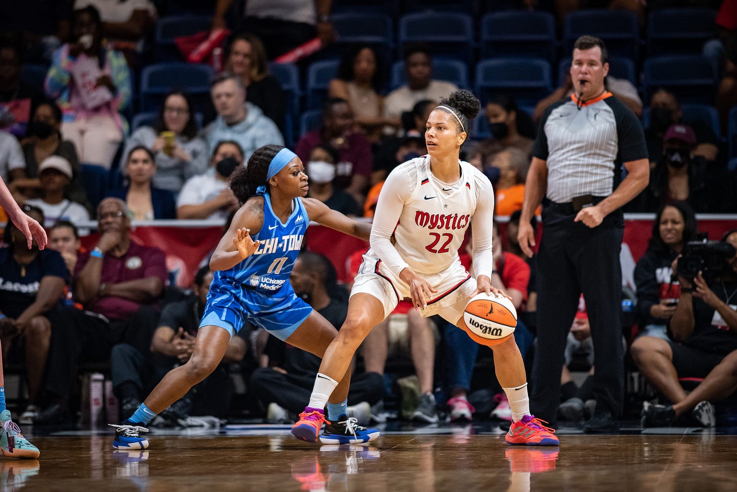 Alysha Clark posting up Dana Evans. Photo by Domenic Allegra