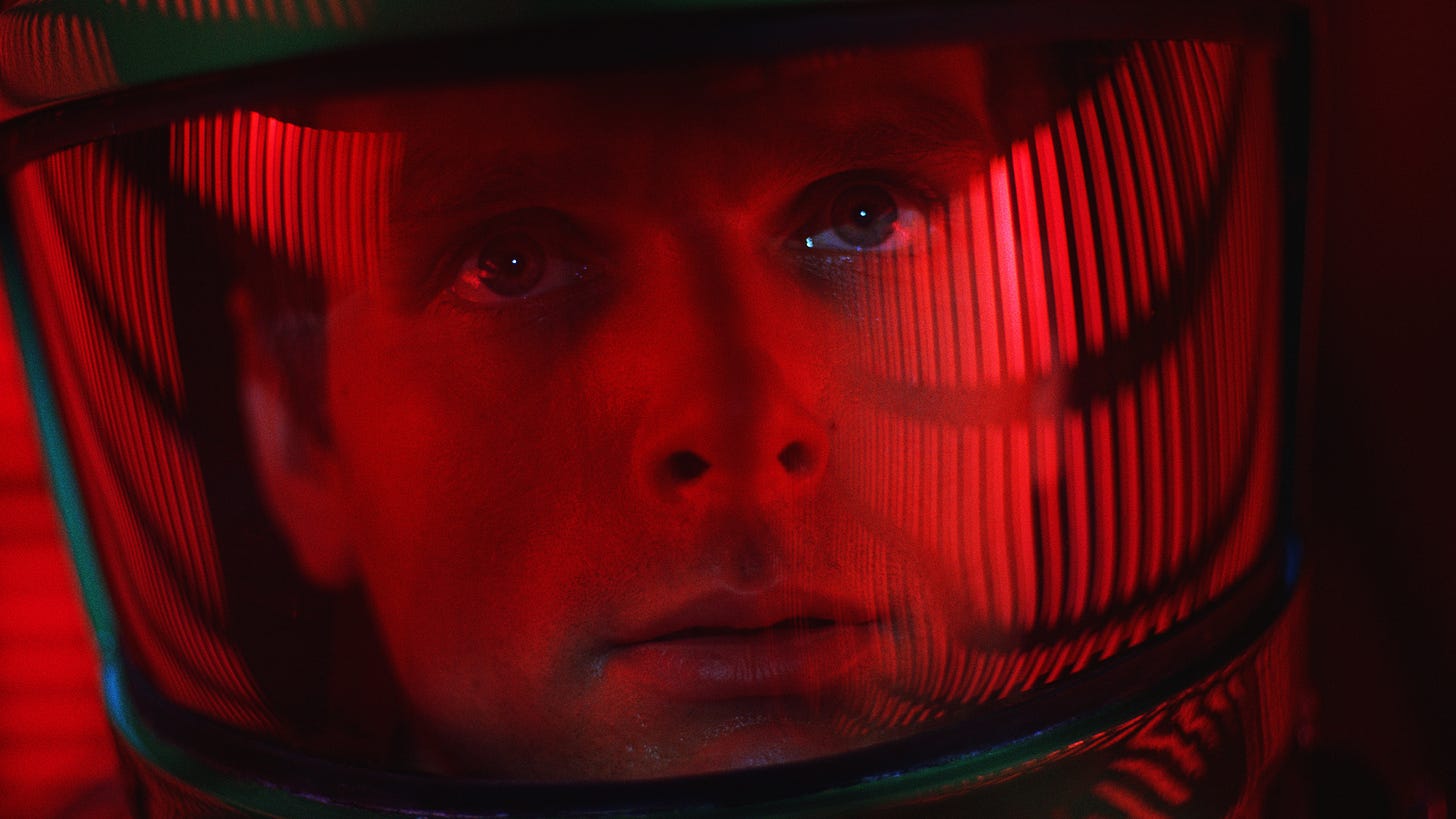 2001: A Space Odyssey Dave looks up in his red tinted helmet