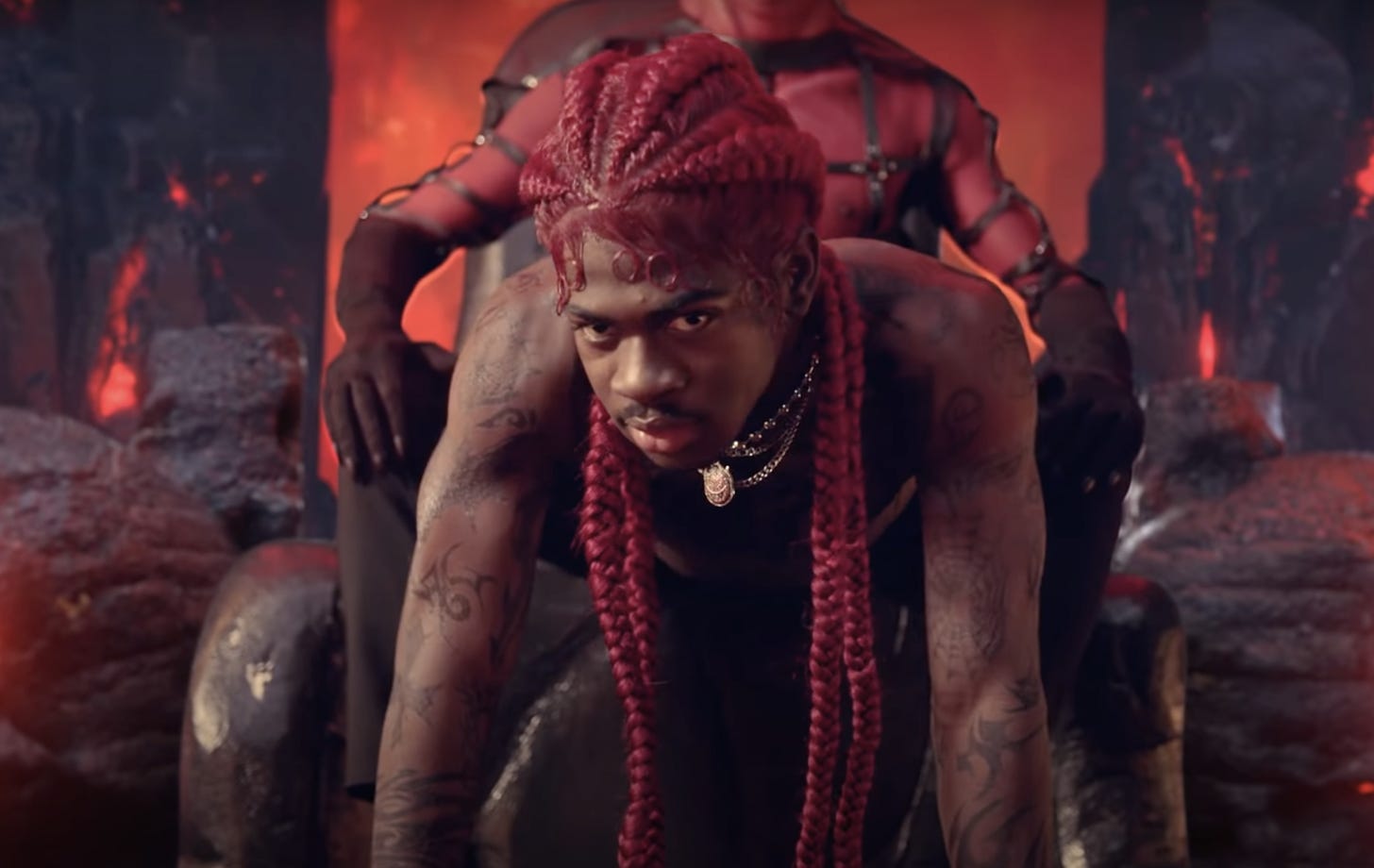 Lil Nas X Gives Satan a Lap Dance in a Fiery, Very Queer New Video | them.