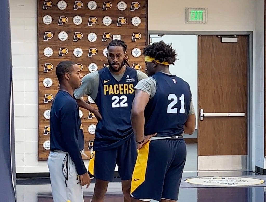 Summer Pacers head coach Ronald Nored with Isaiah Jackson and Terry Taylor.