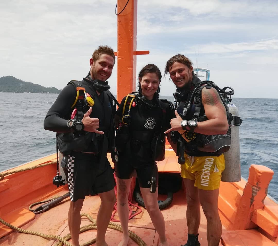 Scuba Divers on a Boat