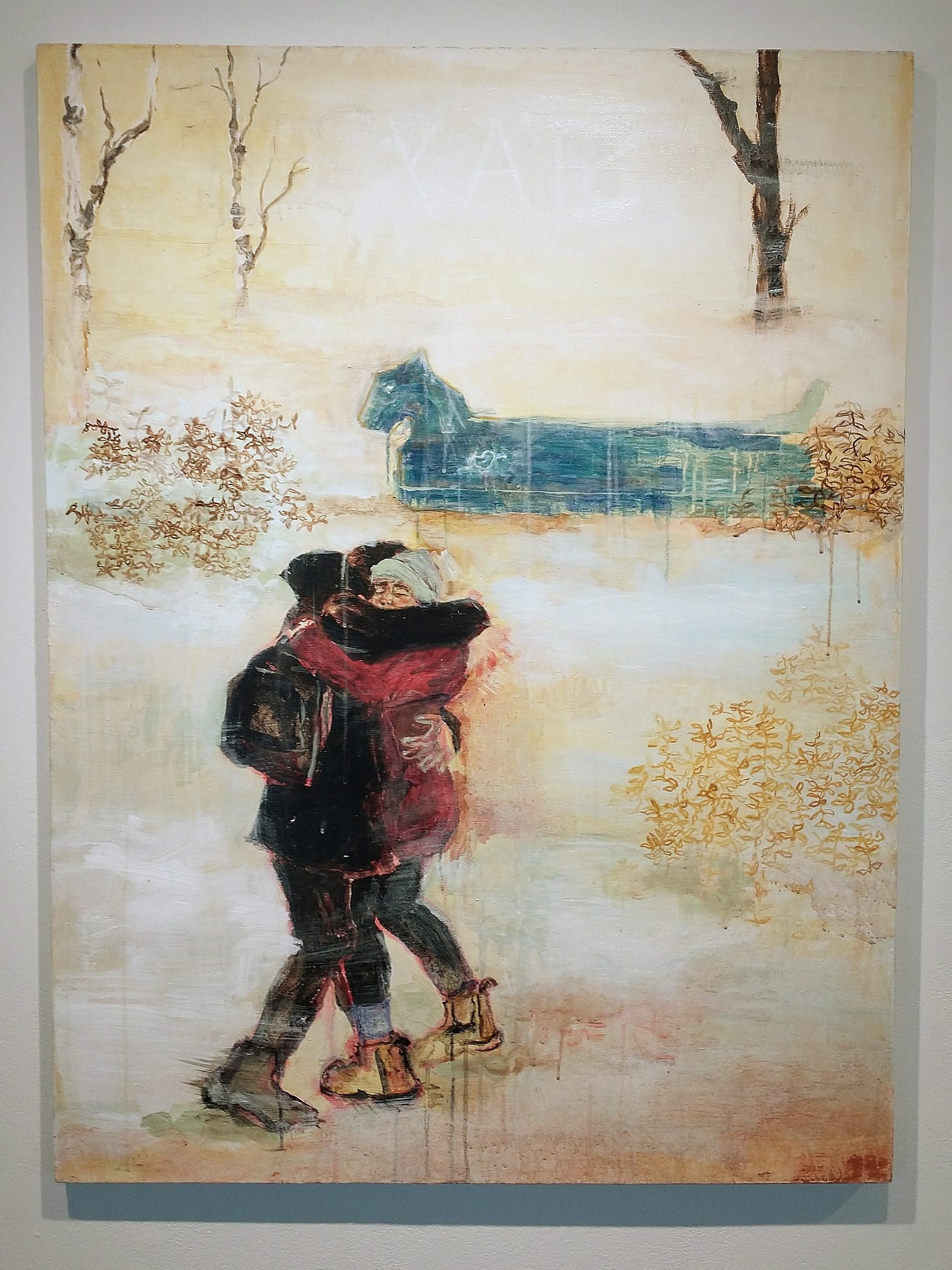 Painting of a winter scene with two young adults hugging in the foreground and a spectral blue horse figure in the background next to trees and shrubs