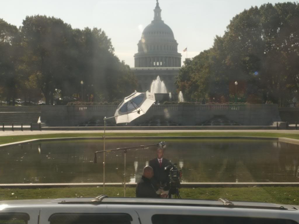 I took this shot from the bus as we were arriving at the protest. Hey, come on over where the news is!!