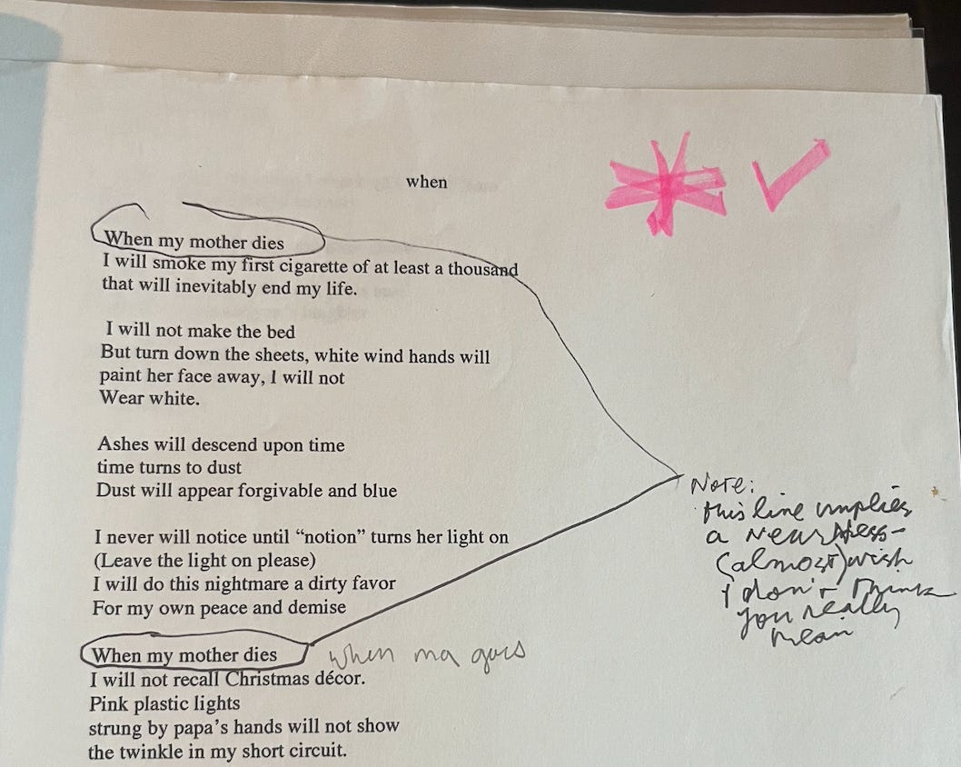 A printed out draft of a poem titled "when," with handwritten notes on it.