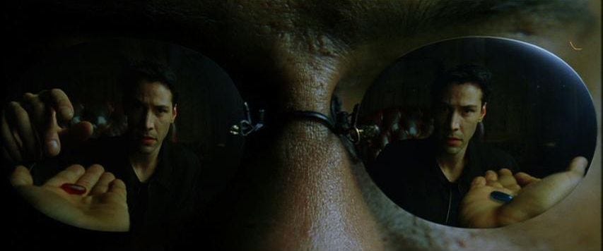 Neo in the reflection of Morpheus’s sunglasses