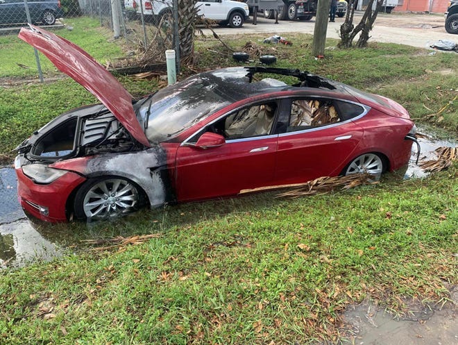 A Tesla whose battery caught fire on Oct. 11, 2022 after having been submerged during the flooding that occurred during Hurricane Ian. The car was located in the parking garage of a residential building in Collier County, Florida. Firefighters from the North Collier Fire Rescue District quickly removed it from the garage and extinguished the fire. It later reignited and was extinguished for a second time. After being submerged during floods, especially in conductive saltwater, electric vehicles can on rare occasions short out and catch fire. They should be towed, not driven, away from buildings and inspected by licensed technicians.