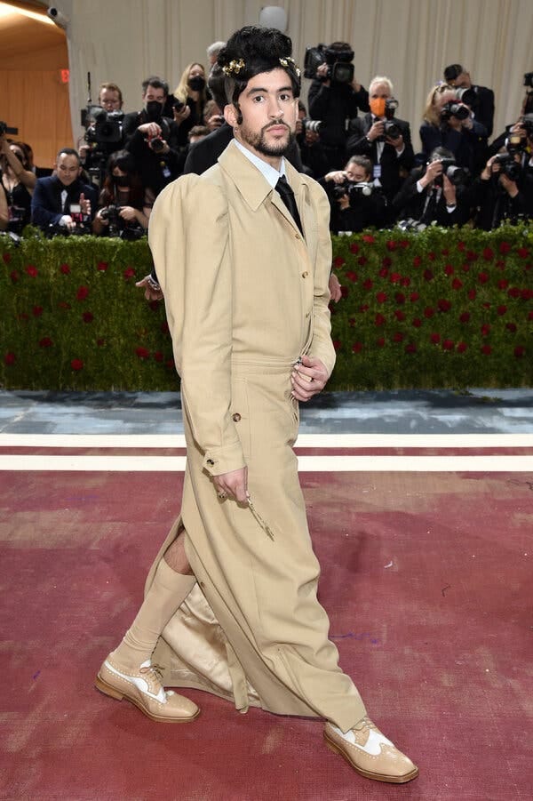 Bad Bunny wearing a Burberry trench dress at the Met Gala in May. 
