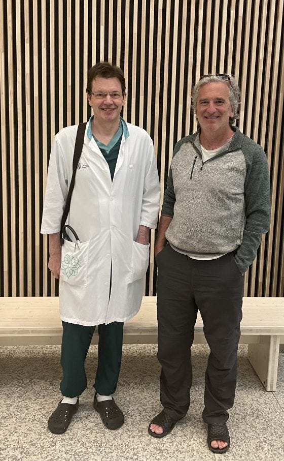 Dr. Jari Laukkanen, left, discussing the Sauna Research Institute with Glenn between surgeries at Sairaala Nova Hospital, Jyväskylä, Finland