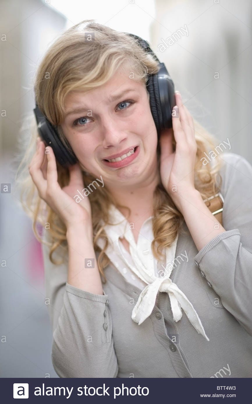 Young woman hearing music Stock Photo - Alamy