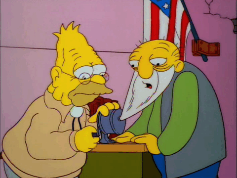 Gif from The Simpsons - Grampa trying to get Jasper's beard out of the pencil sharpener