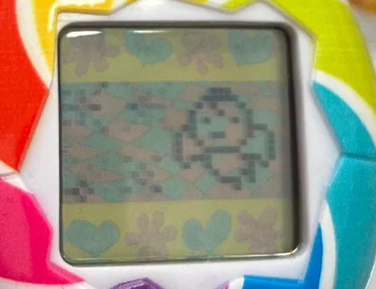 Tamagotchi pictured as a flying angel