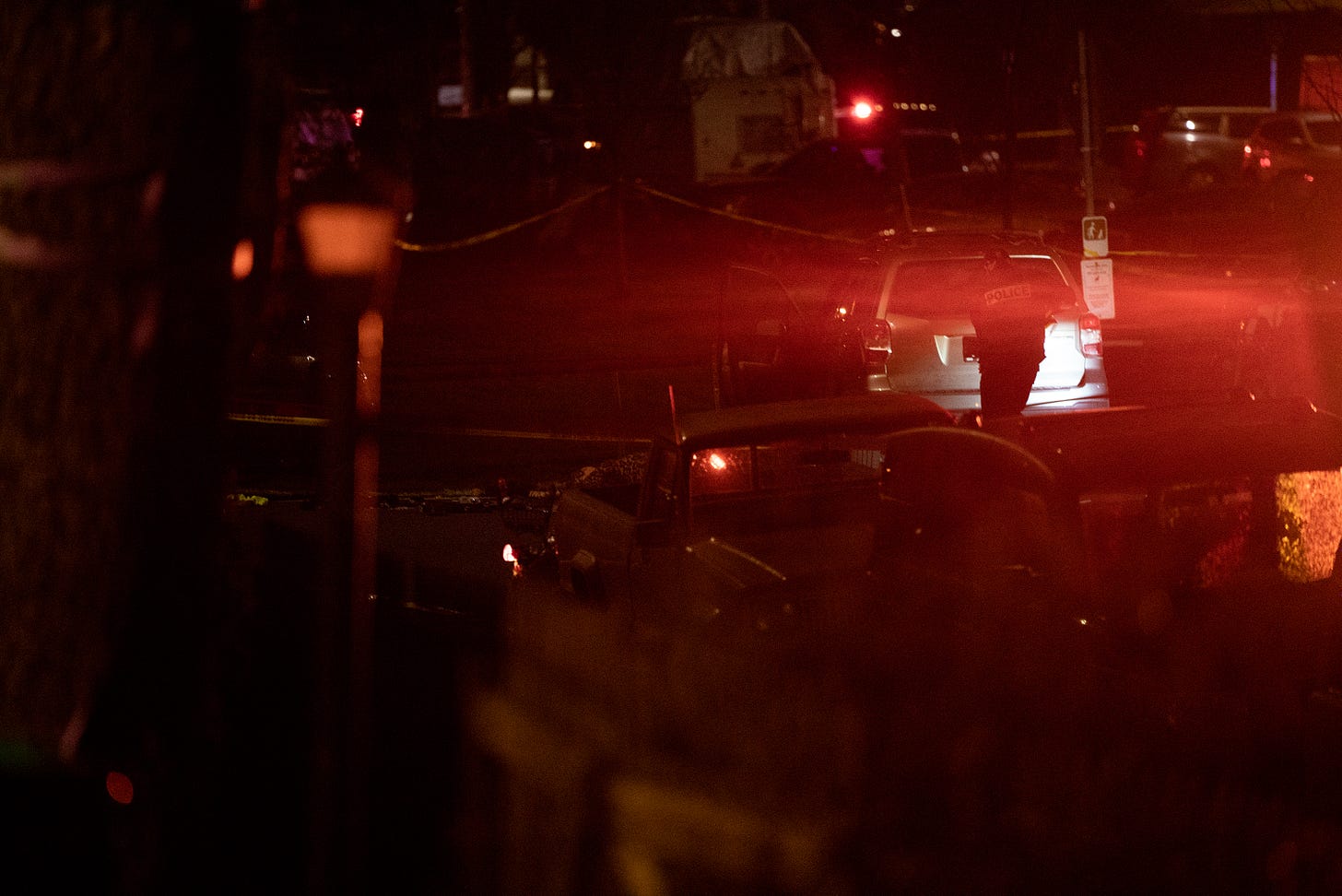Portland police cordon off an area around a shooting on Saturday, Feb. 19, 2022. One person was killed and four injured after a neighbor reportedly confronted a group of protesters near Normandale Park in Northeast Portland.