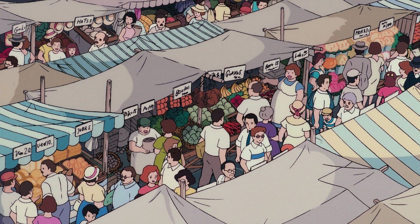 Market stalls by Koriko’s clocktower.