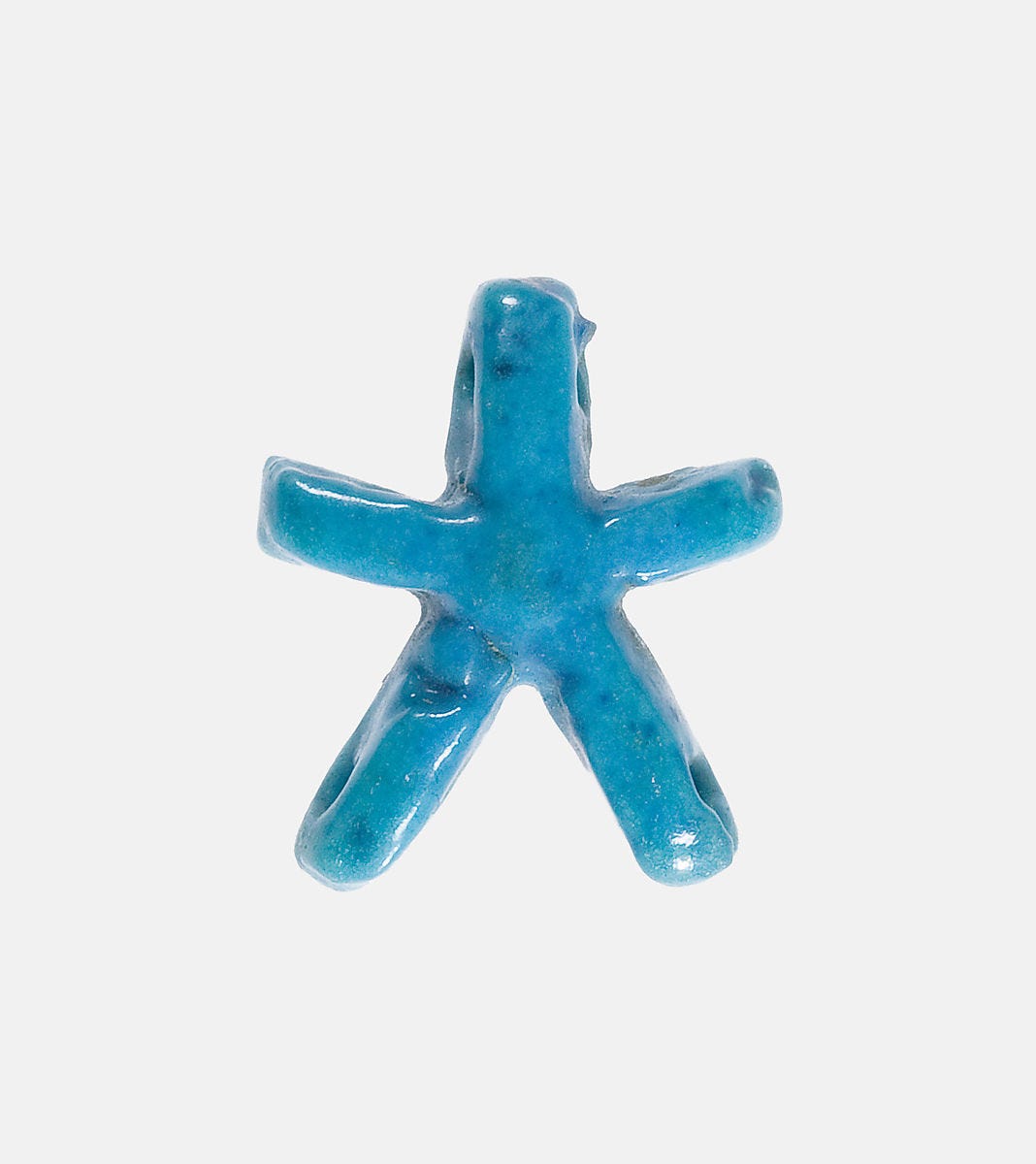 Jewelry element in the shape of a star, Faience 