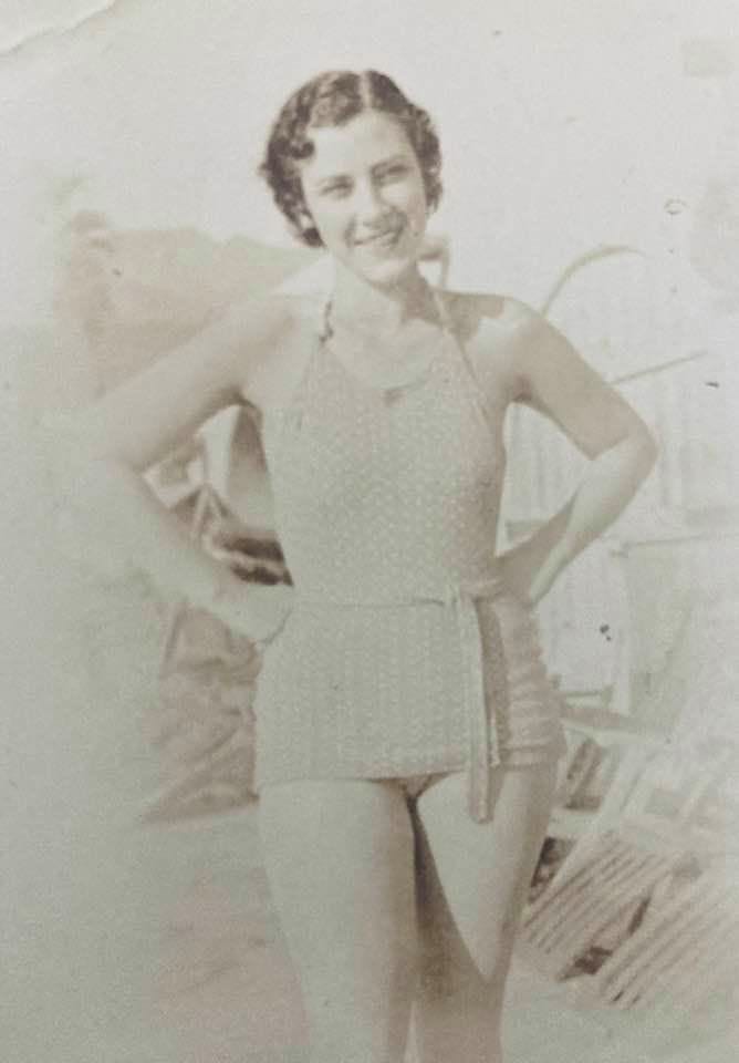 May be a black-and-white image of 1 person, standing and shorts