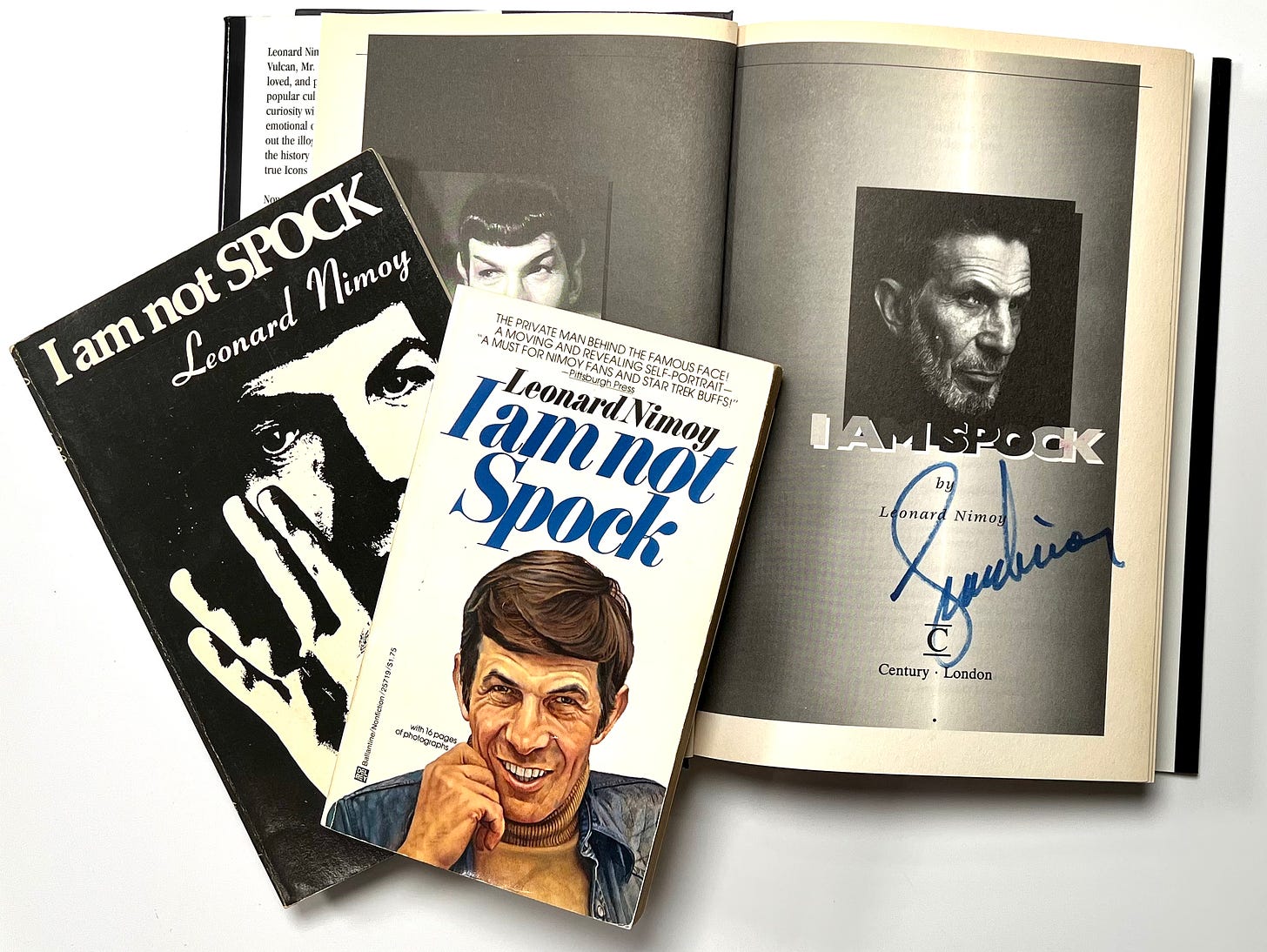 Three books: I am not Spock, a second copy of I am not Spock, and I AM SPOCK which is signed by Leonard Nimoy