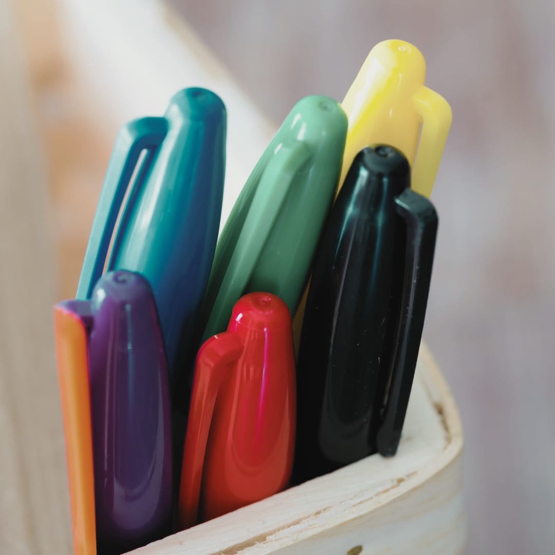 Colorful Sharpie Pens closeup in a basket