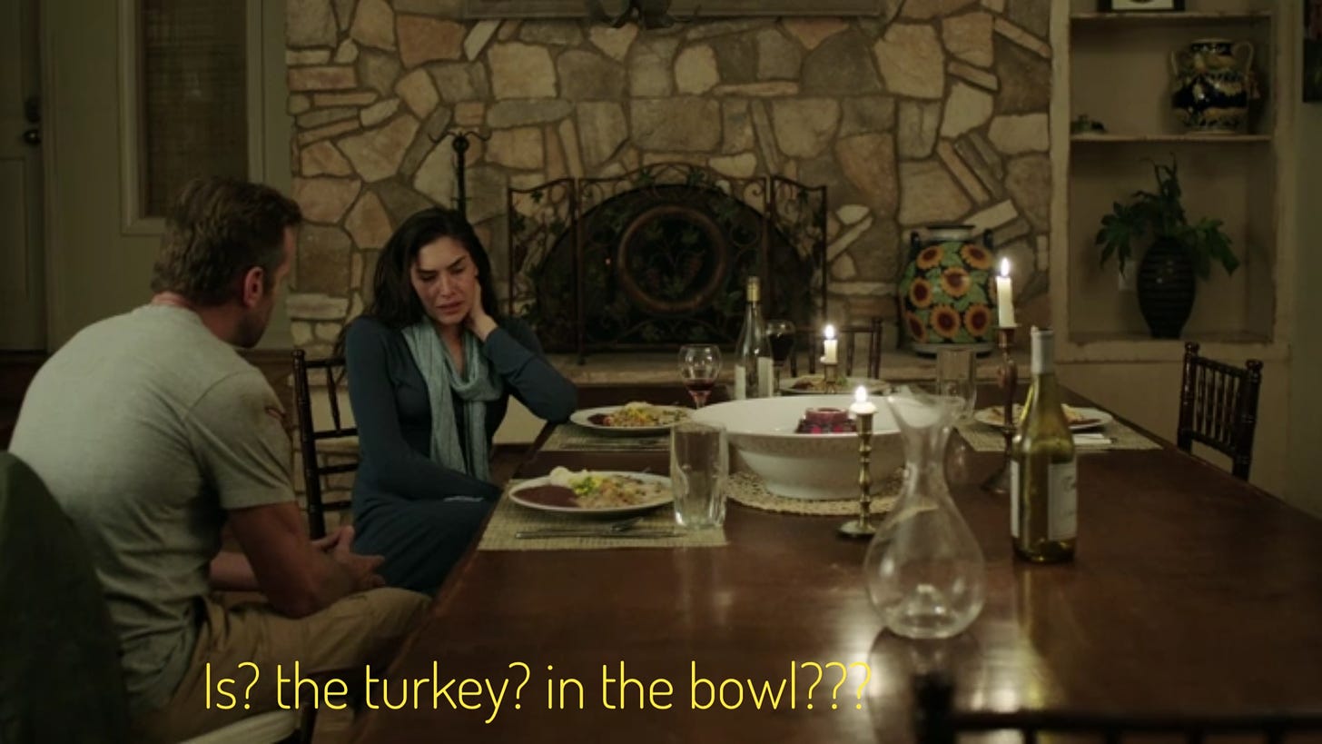 Trish being consoled by DJ at a long table in front of a fireplace, there's a huge bowl with some kind of roast in it, captioned "Is? the turkey? in the bowl???"