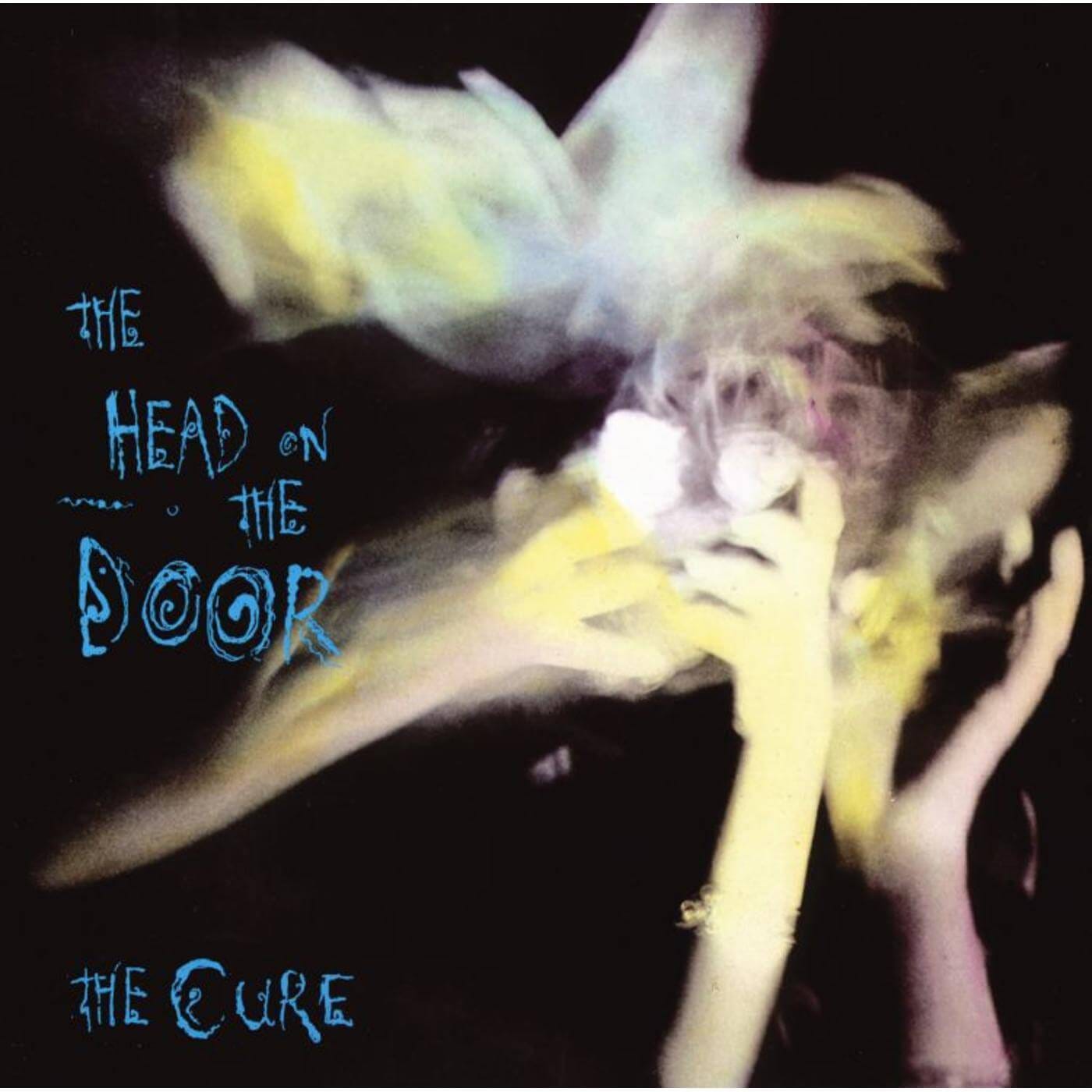 Pochette de disque, main et visages flous sur fond noir, The Cure, Angleterre