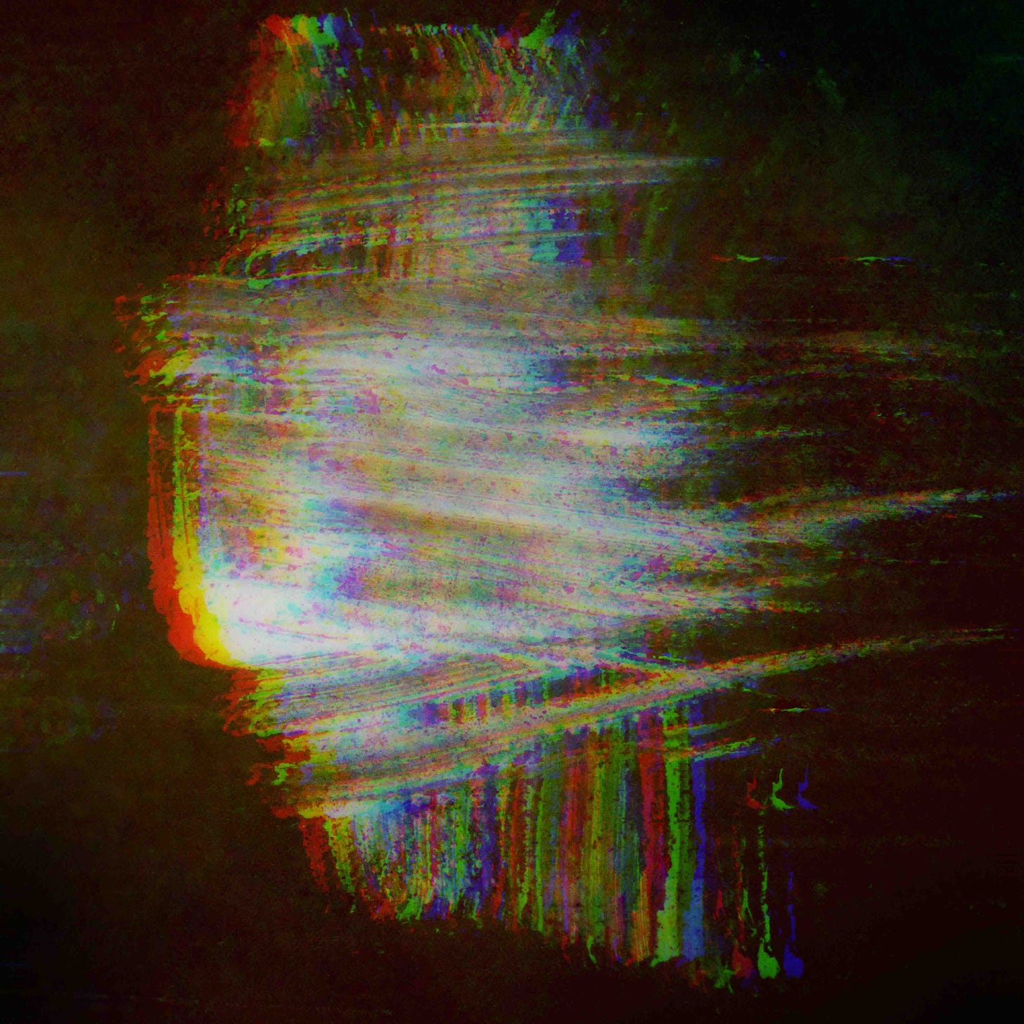 A smear of multi-coloured light against a dark screen. An abstract photo made by Matteo Delred.