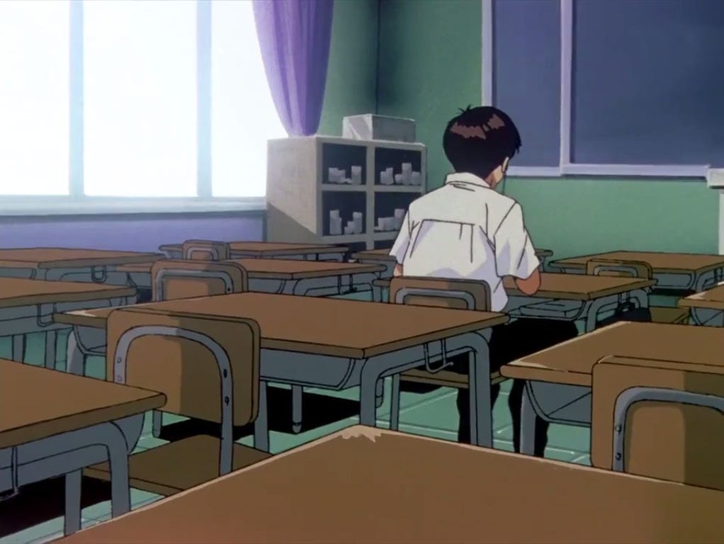 Shinji alone in the classroom.