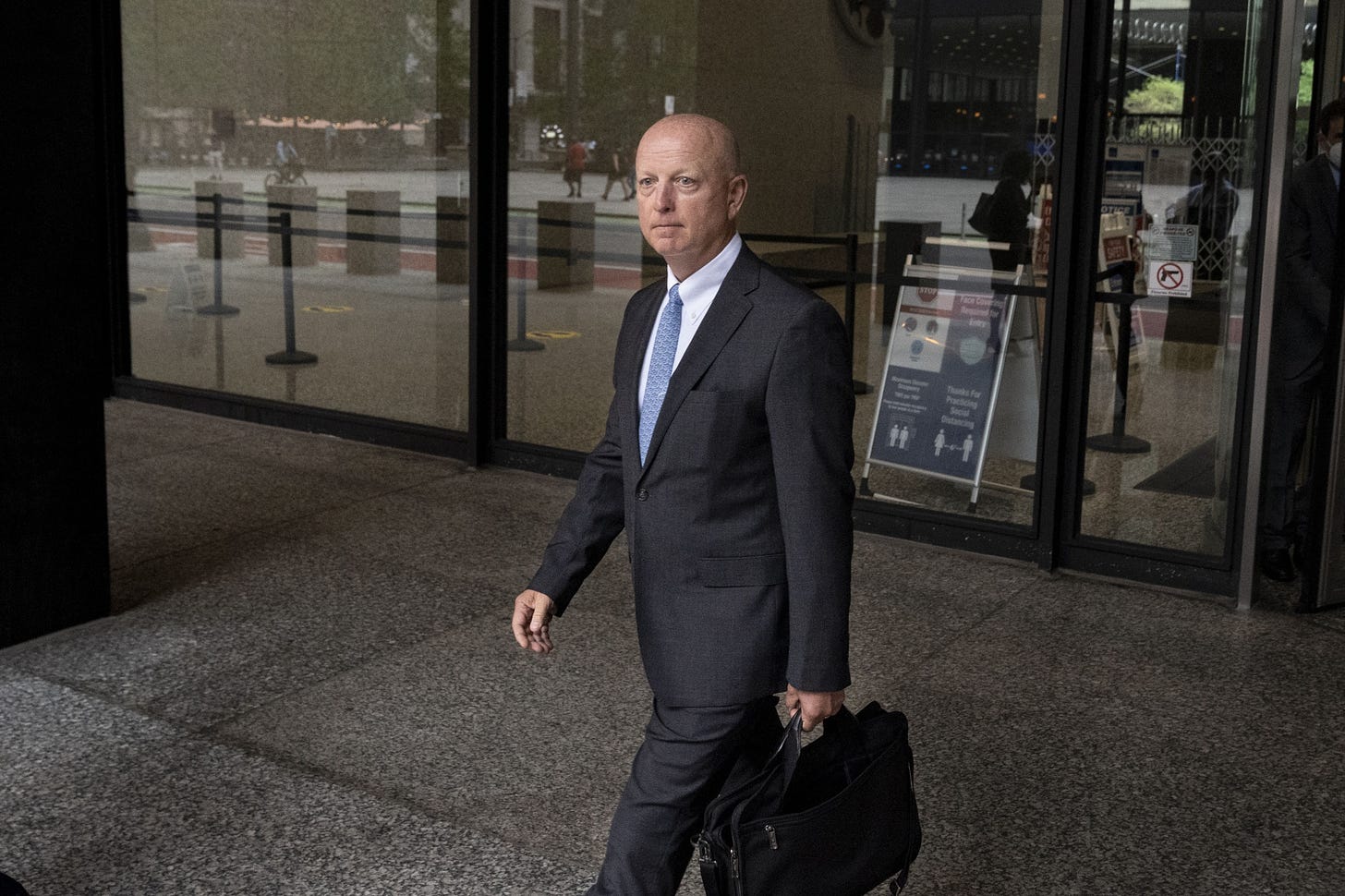 Gregg Smith departs from federal court in Chicago on July 8.