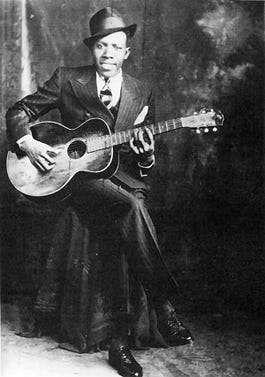 Studio portrait c. 1936, one of only three verified photographs of Johnson