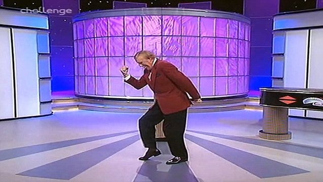 Bruce Forsyth in his iconic strongman pose on his TV shows | Daily Mail  Online