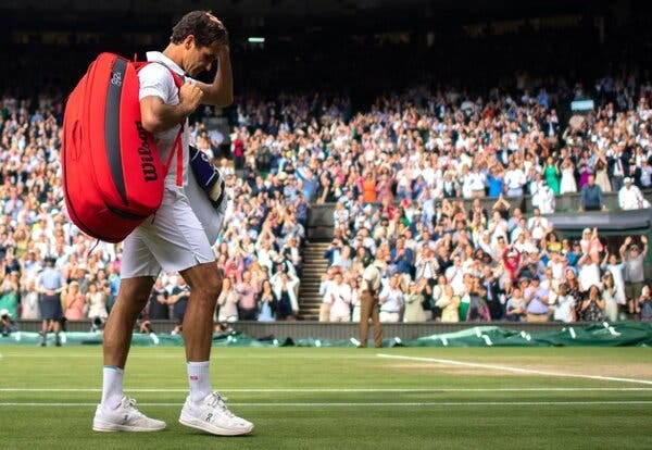 Roger Federer leaves the court after losing in the quarterfinals at Wimbledon in July. 