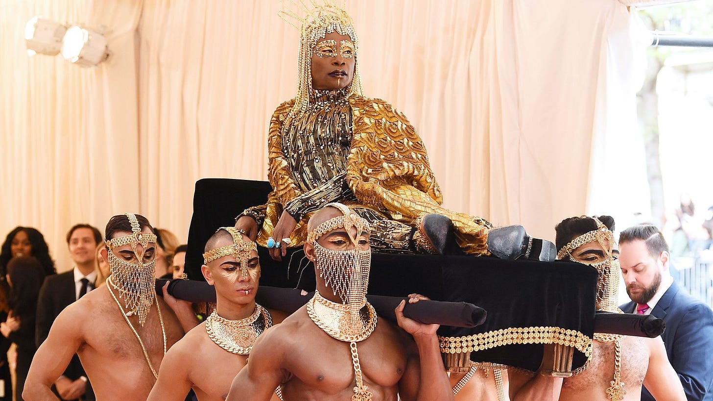 Billy Porter Arrives At The 2019 Met Gala Carried By Shirtless Men |  HuffPost Life