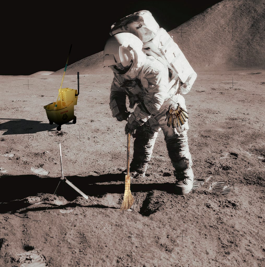 .Astronaut on moon with broom and mop