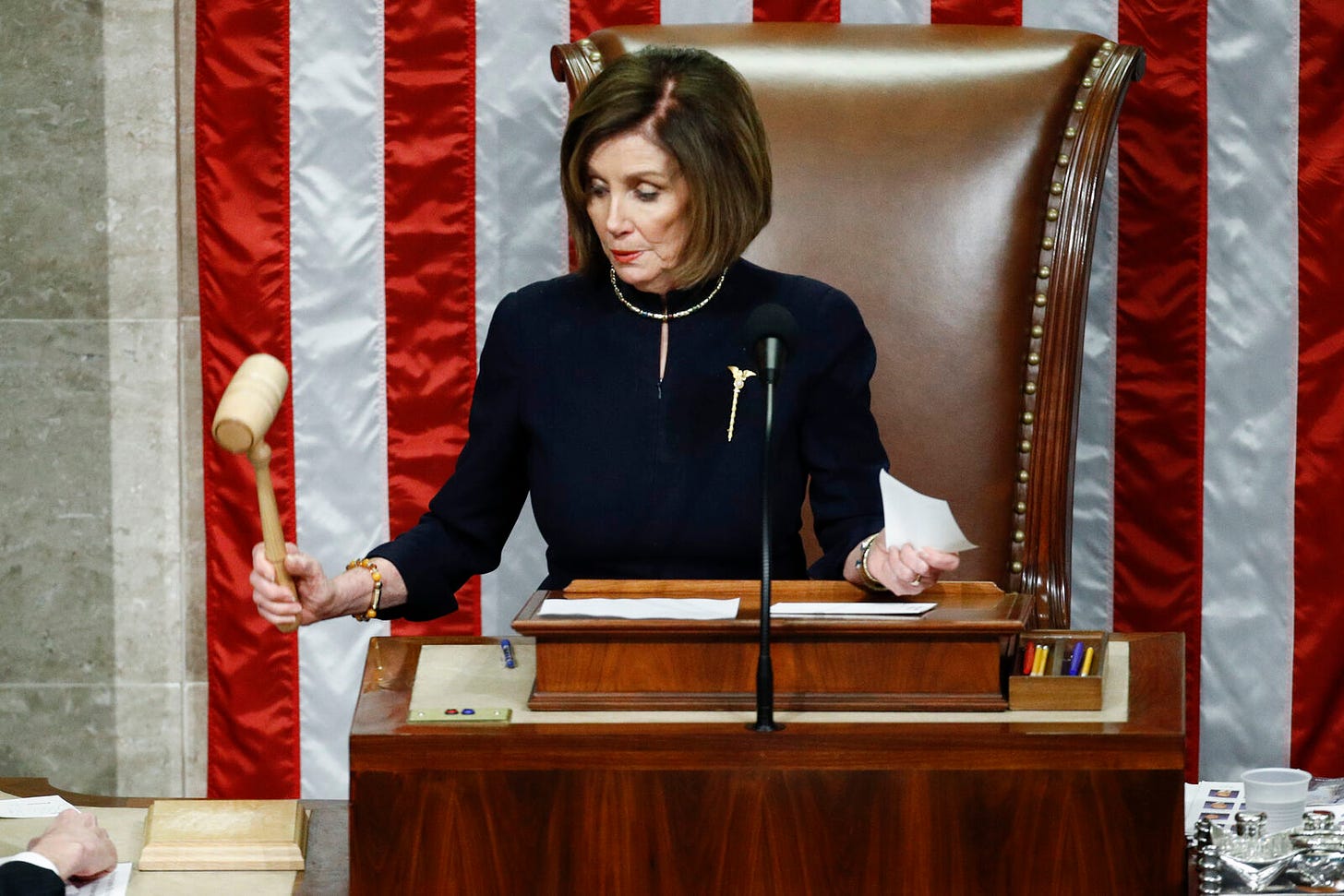 Nancy Pelosi, Speaker of the House, striking down the gavel in the House Chambers.
