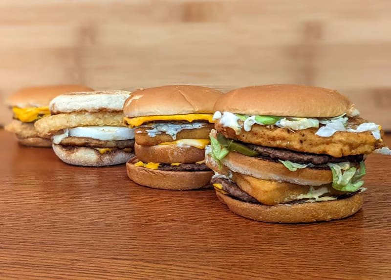 Trying out the McDonald's menu hacks, including the Land, Air and Sea sandwich, Hash Brown McMuffin, Crunchy Double and Surf +Turf. (Nick O'Malley, MassLive)